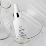 Vitamin C serum sat in glass test tube