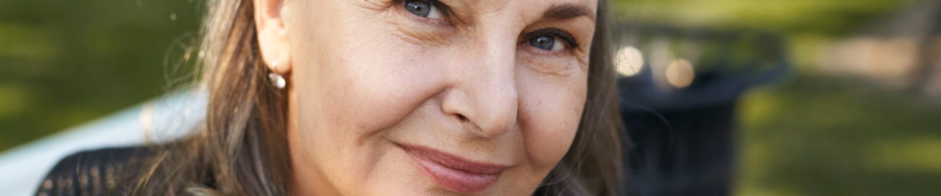 CellDerma Mature Woman Face Smiling Outside Content Image