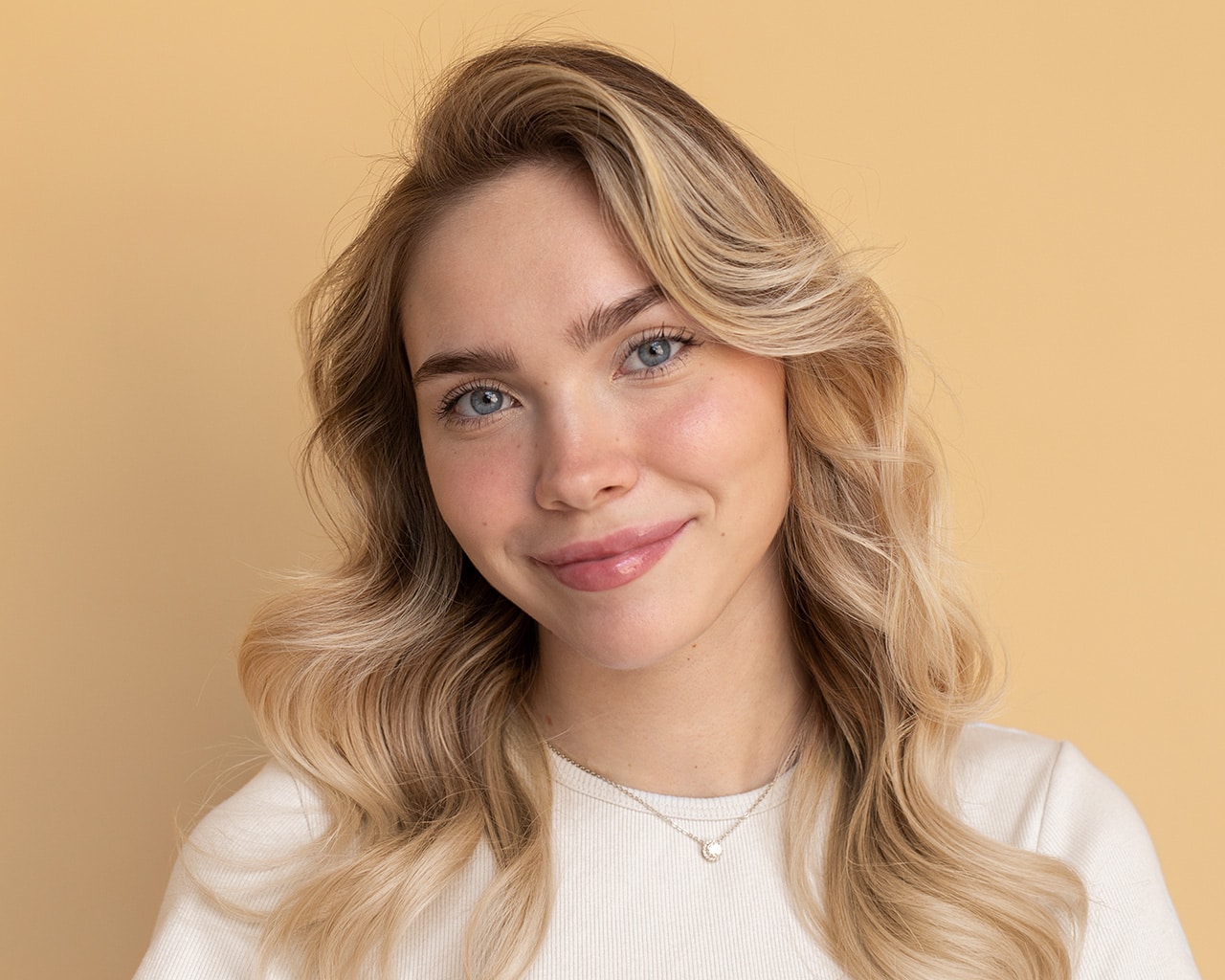 Smiling young woman wearing white t-shirt