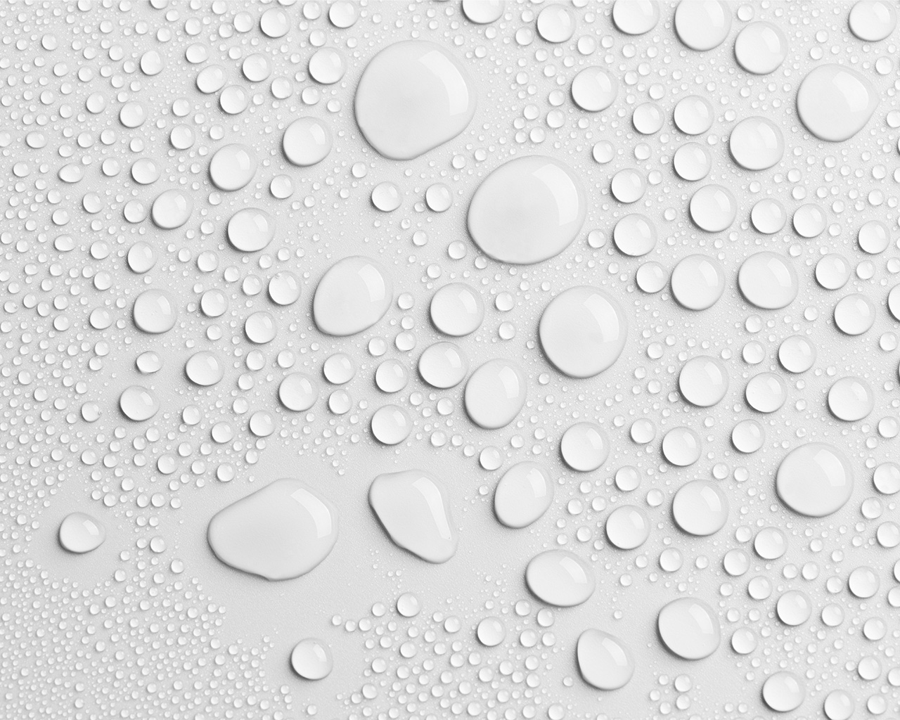 Water droplets on a grey background