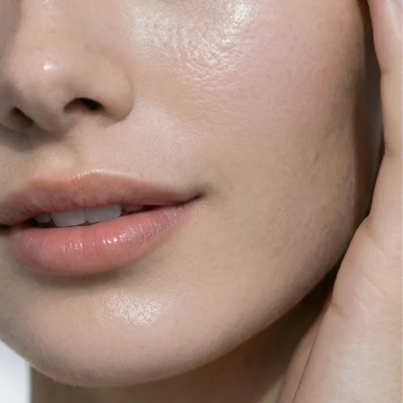 Close-up of radiant healthy skin showing hydration and glow after skincare application.